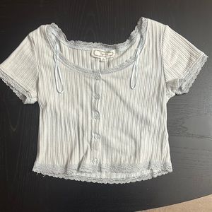Juniors light blue top in size small.